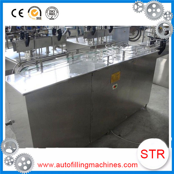 Carbonated water washing filling capping machine in one machine in Brazil